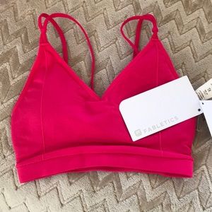 Hot pink Fabletics sports bra